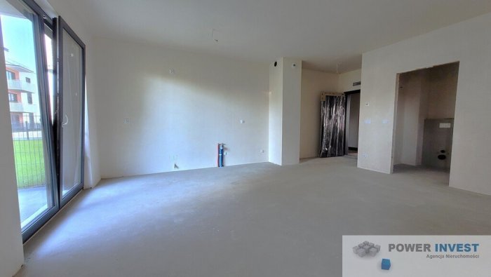 Narożne 3-pokoje z ogr&oacute;dkiem 65 m2, Czerwone Maki