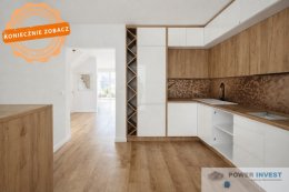 Dom z ogr&oacute;dkiem, garażem i miejscem postojowym