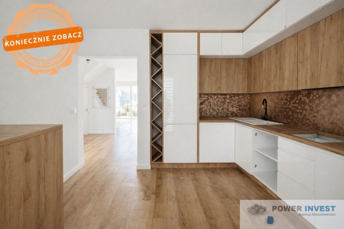 Dom z ogr&oacute;dkiem, garażem i miejscem postojowym