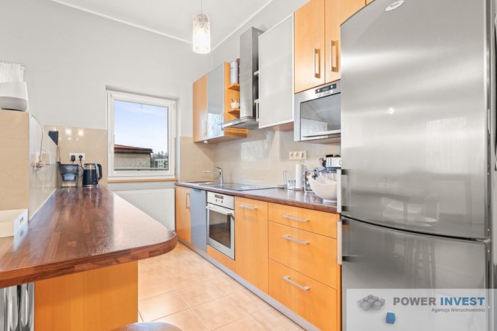 MIESZKANIE I GARAŻ W KAMERALNYM OGRODZONYM BUDYNKU